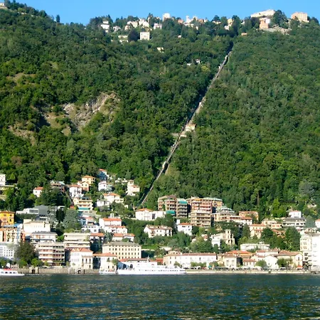 Апартаменты Portatorre Suite, A Charming In The Heart Of Como, Free Private Parking, Air Conditioning & More! Комо